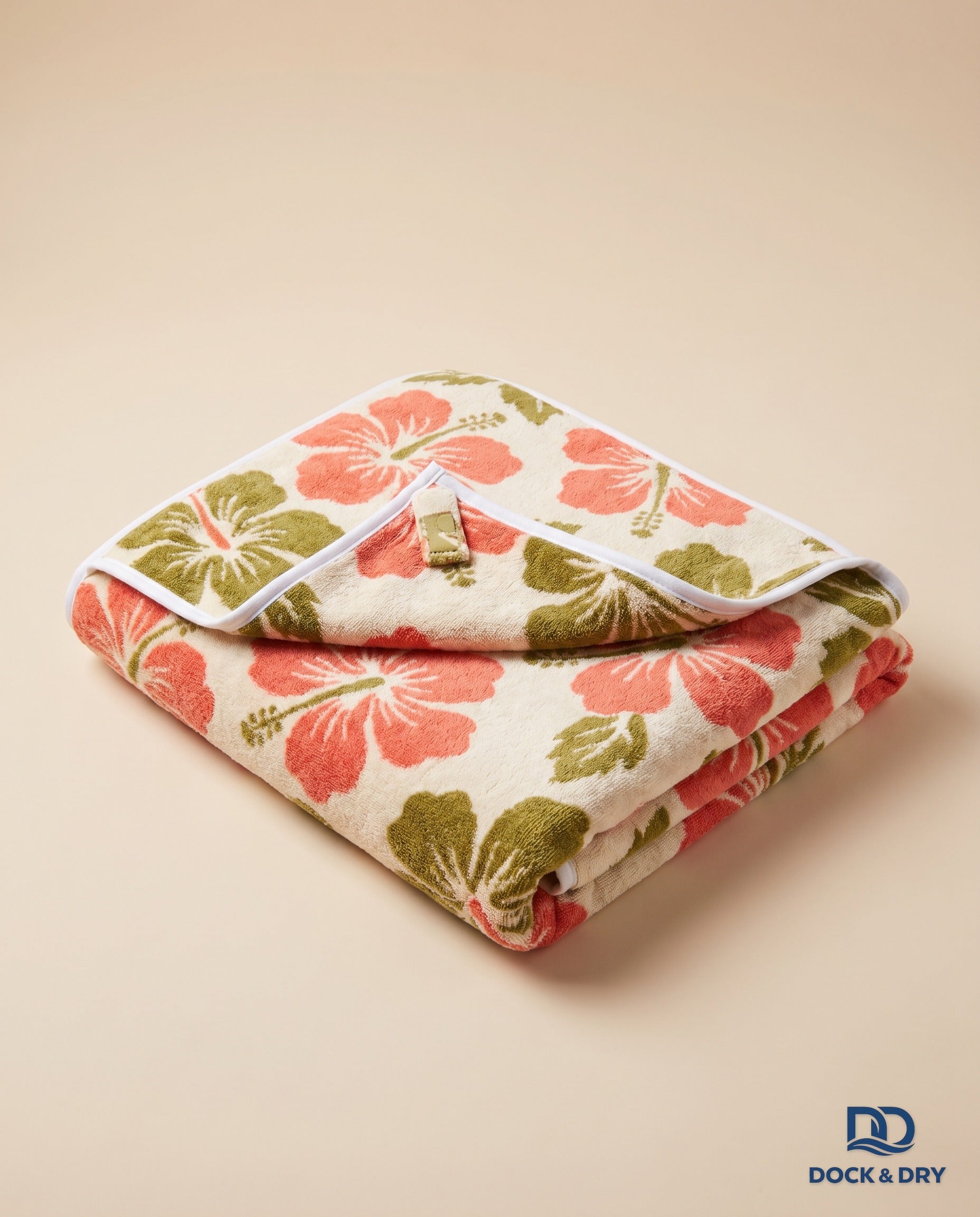 Dock & Dry magnetic beach towel – Tropical Hibiscus, folded with corner magnets